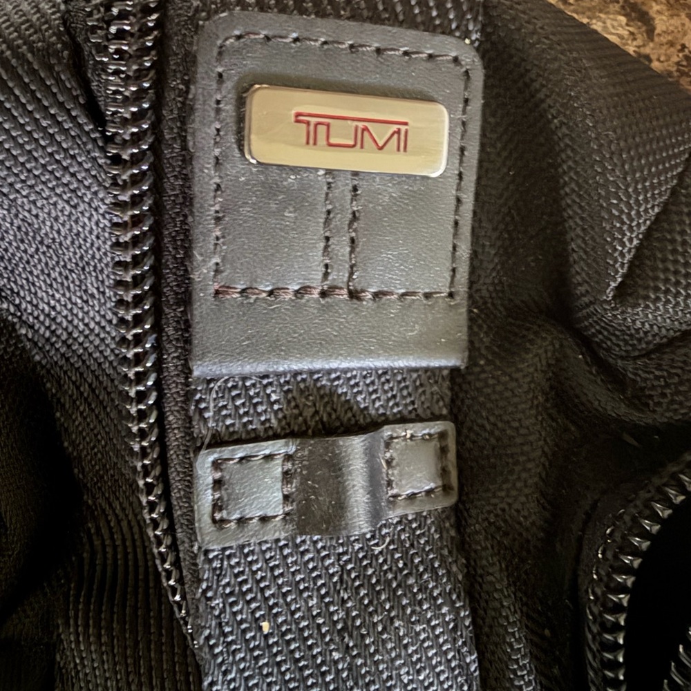 Unisex Tumi sling bag